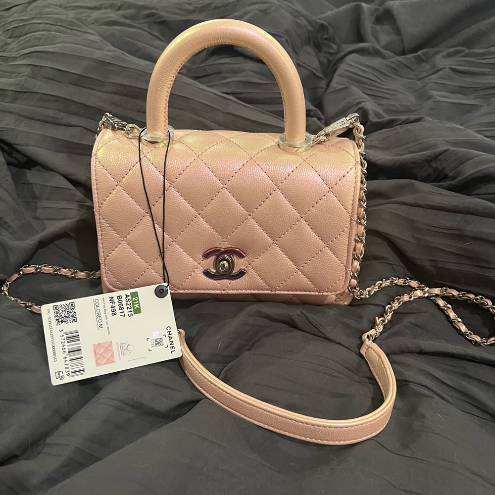 CHANEL

21K Iridescent Pink XTRA Small Coco Handle classic flap bag